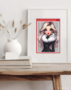 Taylor Swift Premium Fine Art Paper Shown in White Frame Print Taylor Swift Fan Art featuring Swiftie on Time Magazine Cover in a matted white frame sitting on a wooden table. Taylor has her cat Benji wrapped around her neck.